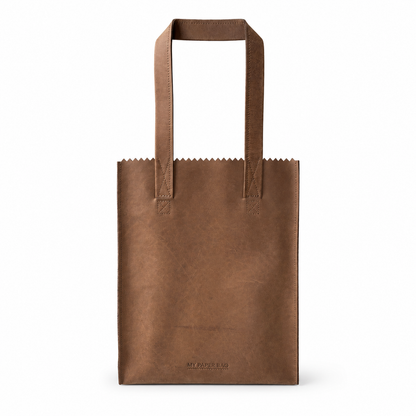 Brown paper bag with a handle on a white background