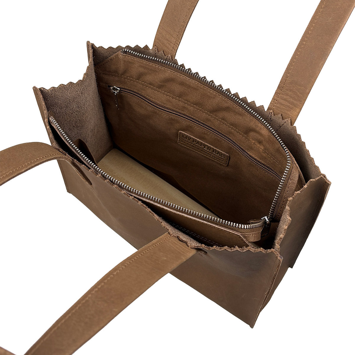 Brown leather handbag with visible brand logo on a white background