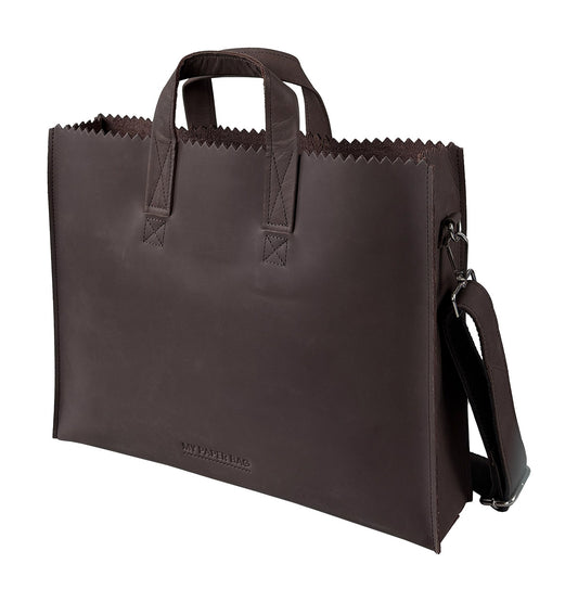 Brown leather tote bag with shoulder strap on a white background