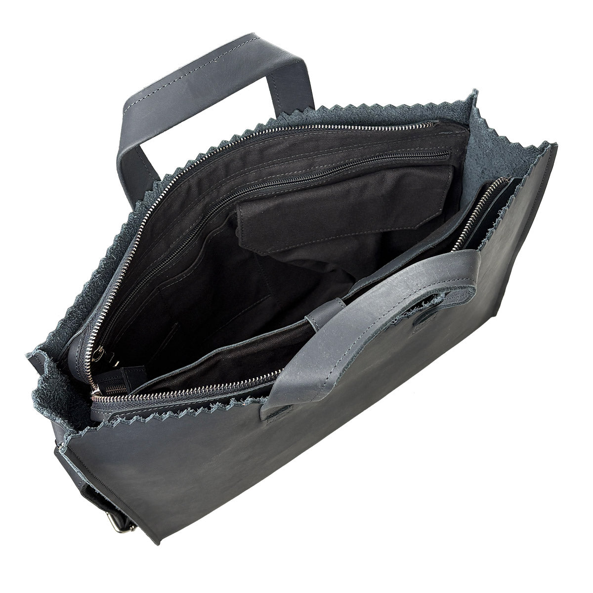 Black briefcase with open lid on a white background