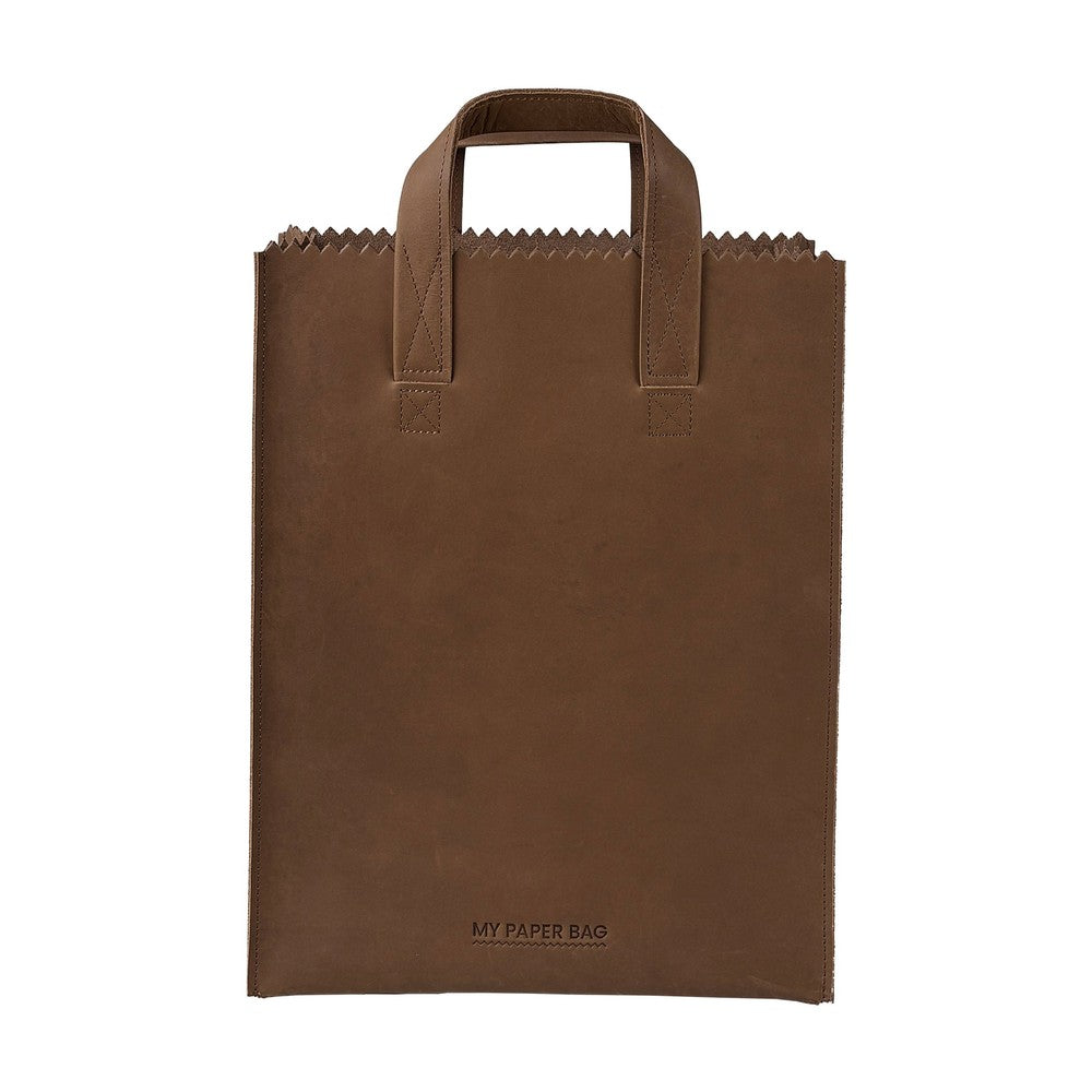 Brown paper bag with handles on a white background