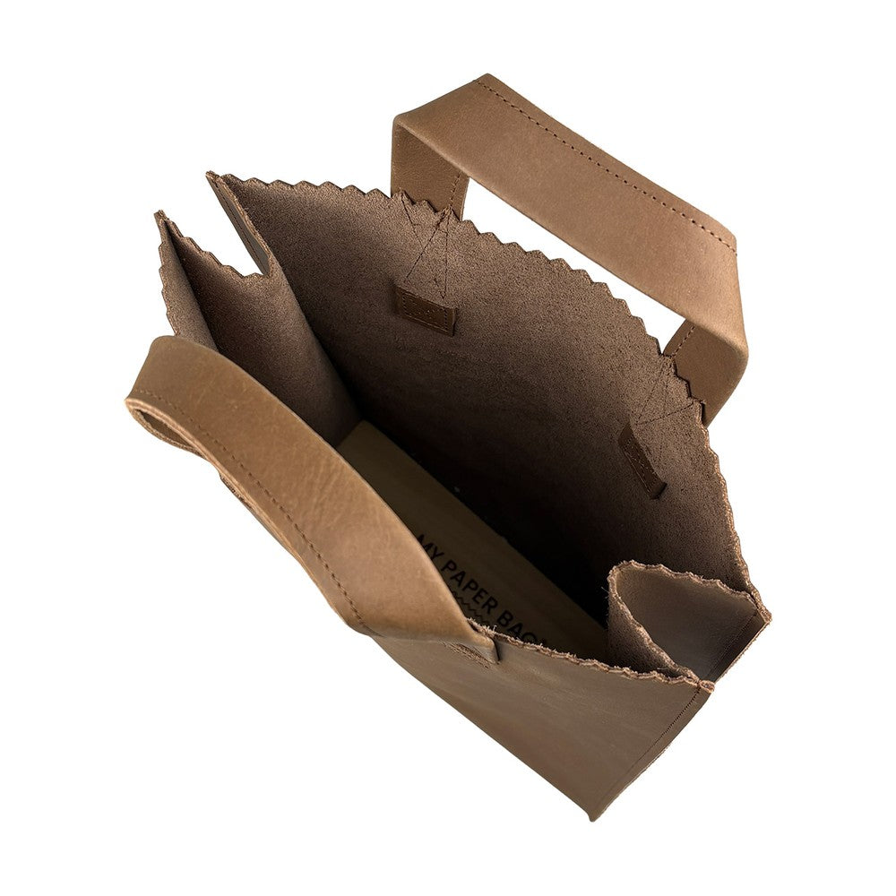 Brown cardboard bag with a handle on a white background